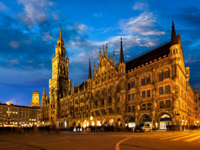 Marienplatz central square illuminated at night with New Town Hall (Neues Rathaus) - a famous tourist attraction. Munich, Germany