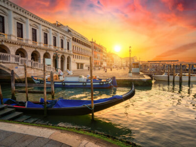 Gondola and architecture in Venice at sunset, Italy
