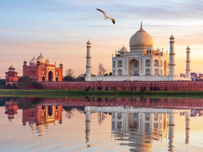 Famous Taj Mahal Mausoleum on the bank of the Yumana river in Agra, India.