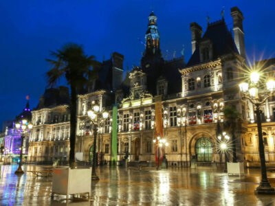 The view of Hotel de Ville (City Hall) in Paris, France at rainy night.